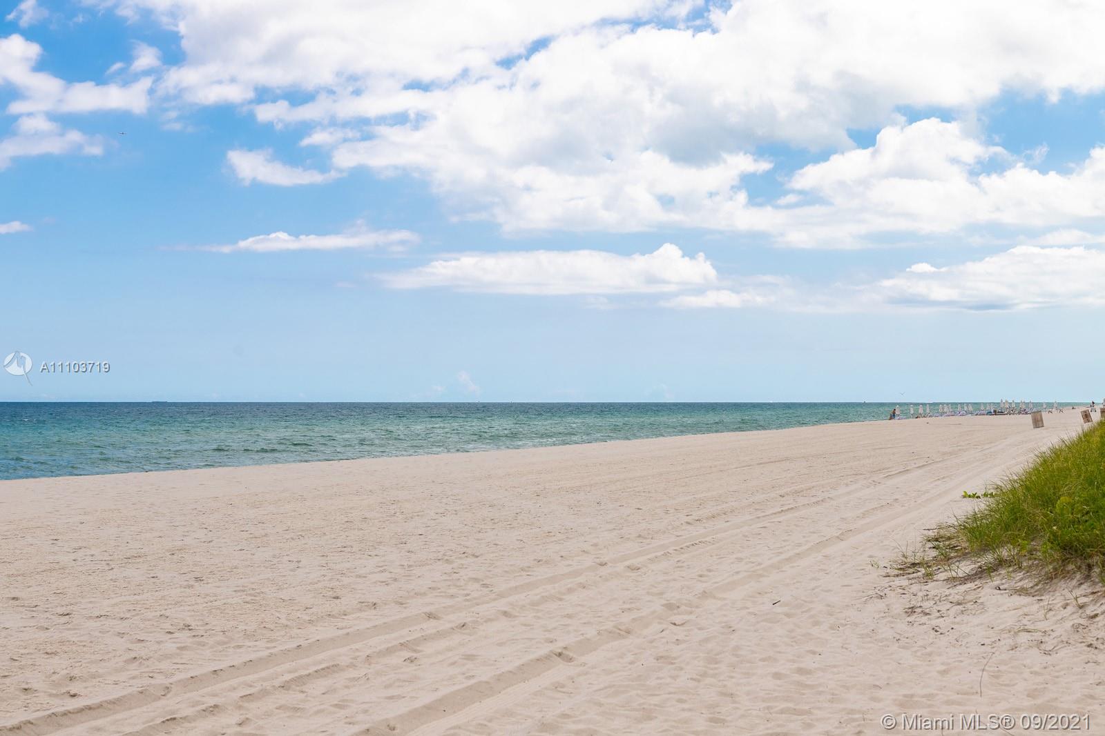 9195 Collins Avenue, Unit 710 Surfside, FL 33154 - Photo 6 of 15 a view of an ocean and beach