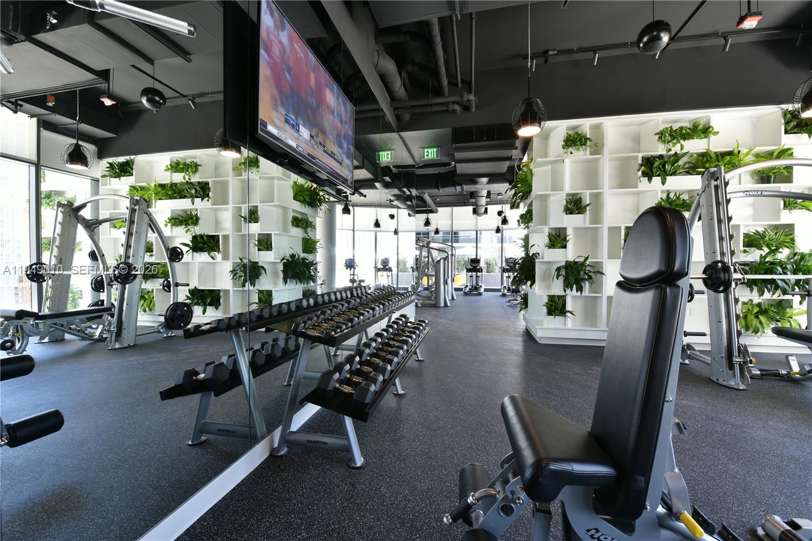 45 Southwest 9th Street, Unit 3405 Miami, FL 33130 - Photo 45 of 47 a view of gym equipment in a room
