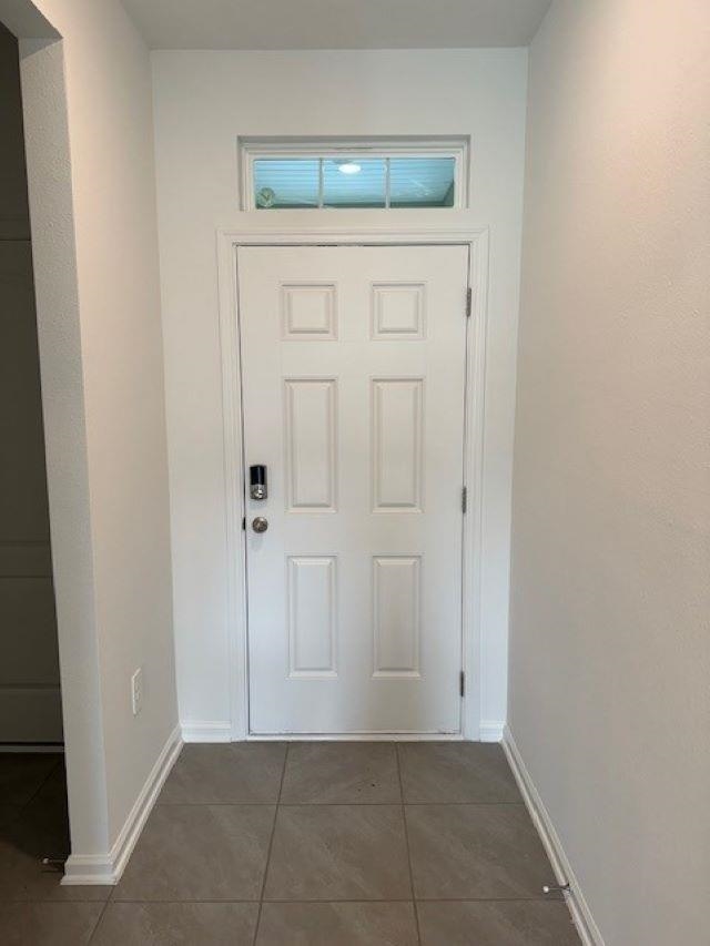 282 Redbud Road Palm Coast, FL 32137 - Photo 5 of 41 an empty room with windows