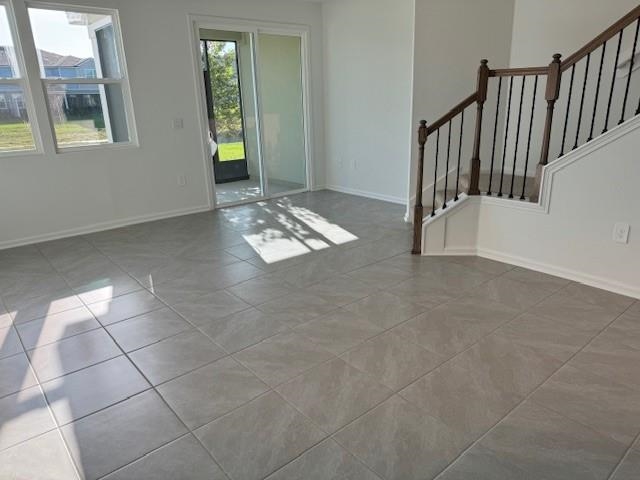 282 Redbud Road Palm Coast, FL 32137 - Photo 9 of 41 a view of an empty room with a window