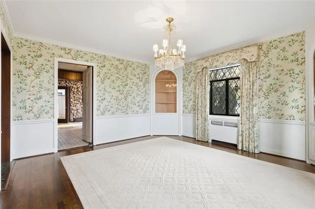 a kitchen with stainless steel appliances granite countertop a stove and a microwave