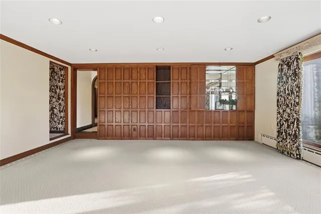 a view of a hallway view with staircase