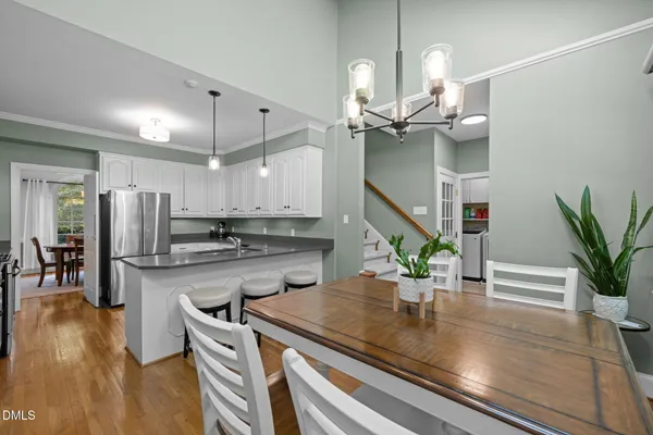 a view of a dining room with furniture window and outside view