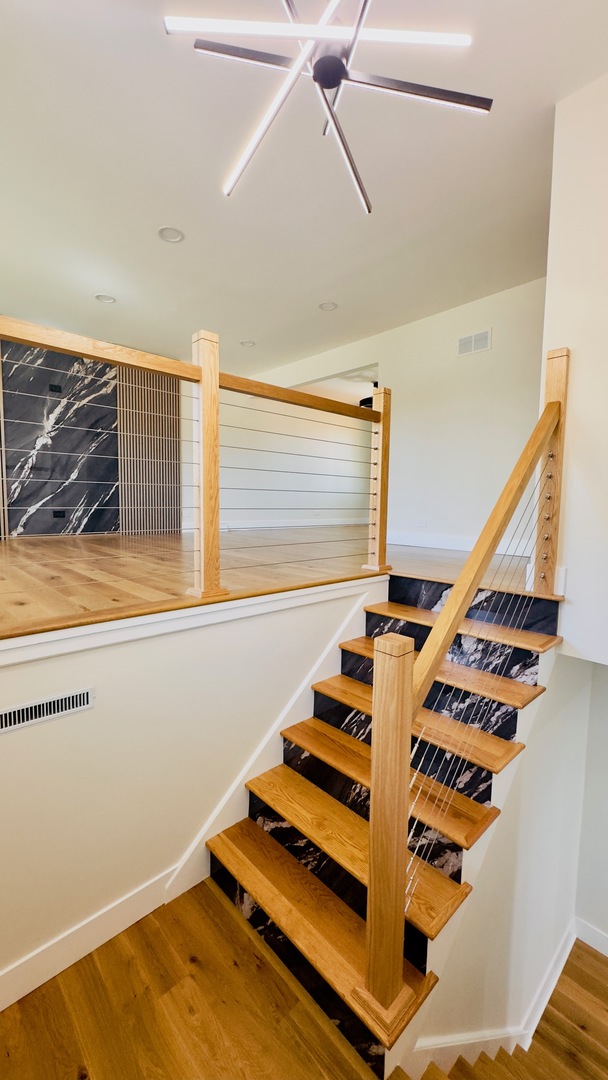 527 Northgate Road Lindenhurst, IL 60046 - Photo 2 of 35 a view of staircase with white walls