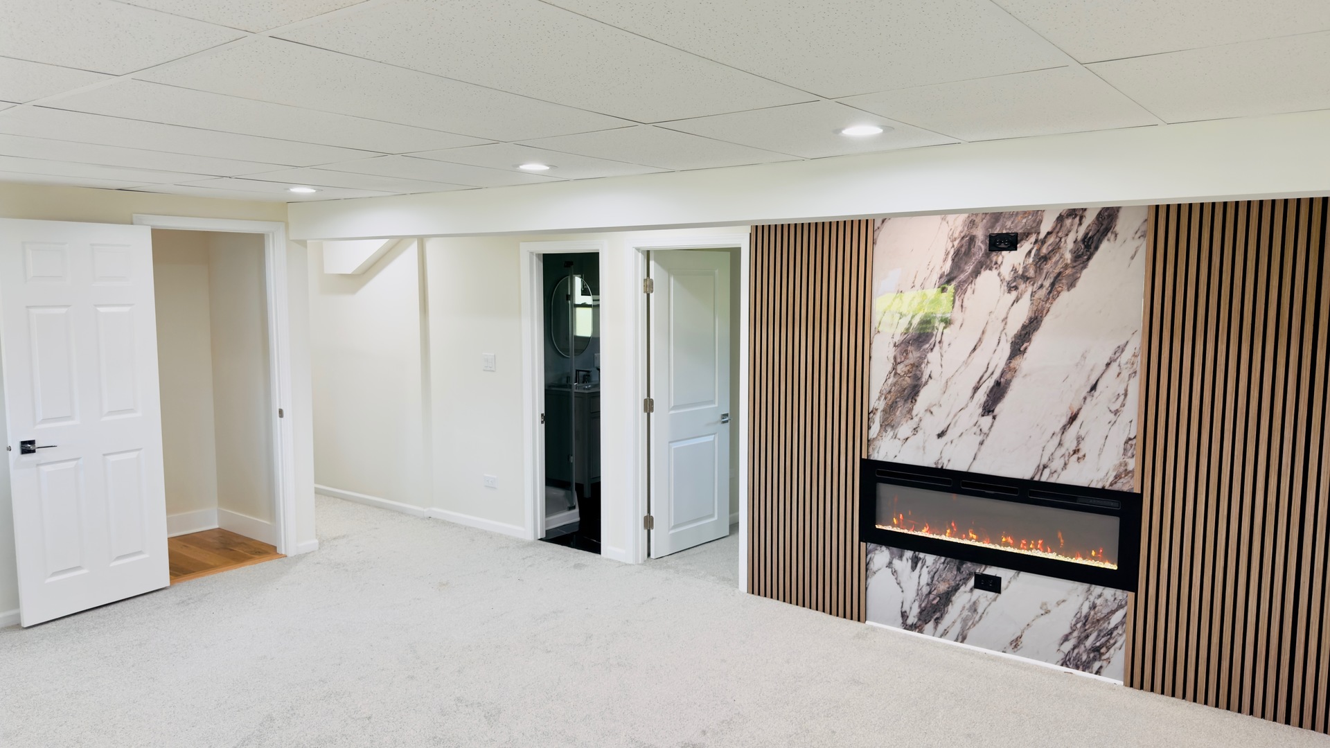 527 Northgate Road Lindenhurst, IL 60046 - Photo 24 of 35 a view of a hallway with paintings on the wall