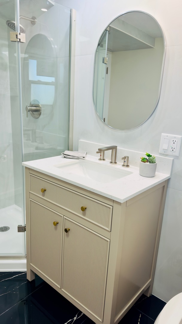 527 Northgate Road Lindenhurst, IL 60046 - Photo 27 of 35 a bathroom with a sink and a mirror