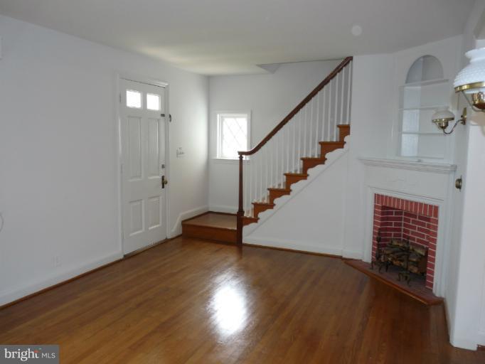 4312 Barrington Road Baltimore, MD 21229 - Photo 13 of 30 Living Room w/ Gleaming Hardwood Floors