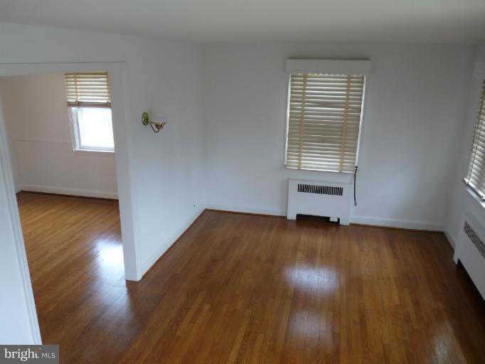 4312 Barrington Road Baltimore, MD 21229 - Photo 23 of 30 Living Room w/ Gleaming Hardwood Floors