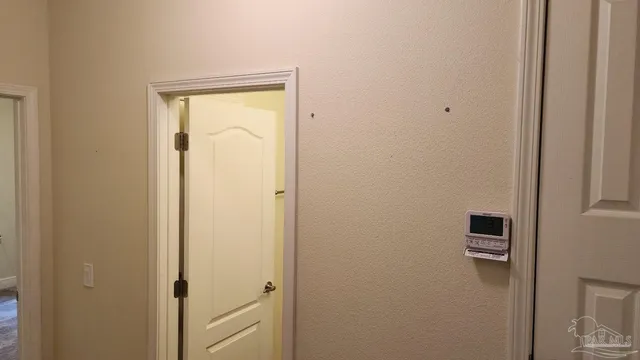 a view of a small space with a fan