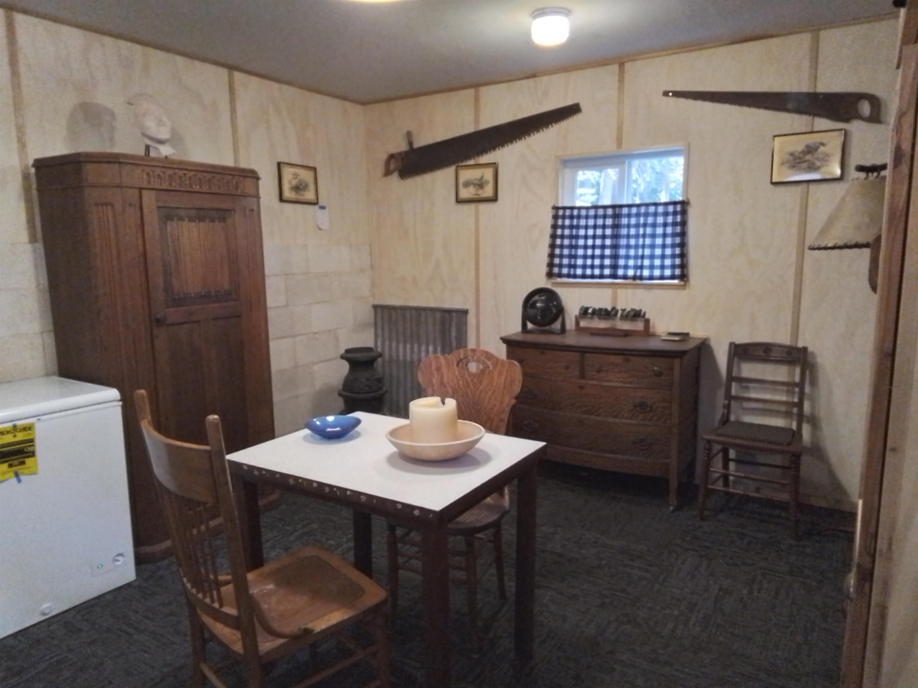 199 Hunewill Drive Bridgeport, CA 93517 - Photo 20 of 40 Interior space featuring wall paneling and a carpeted floor