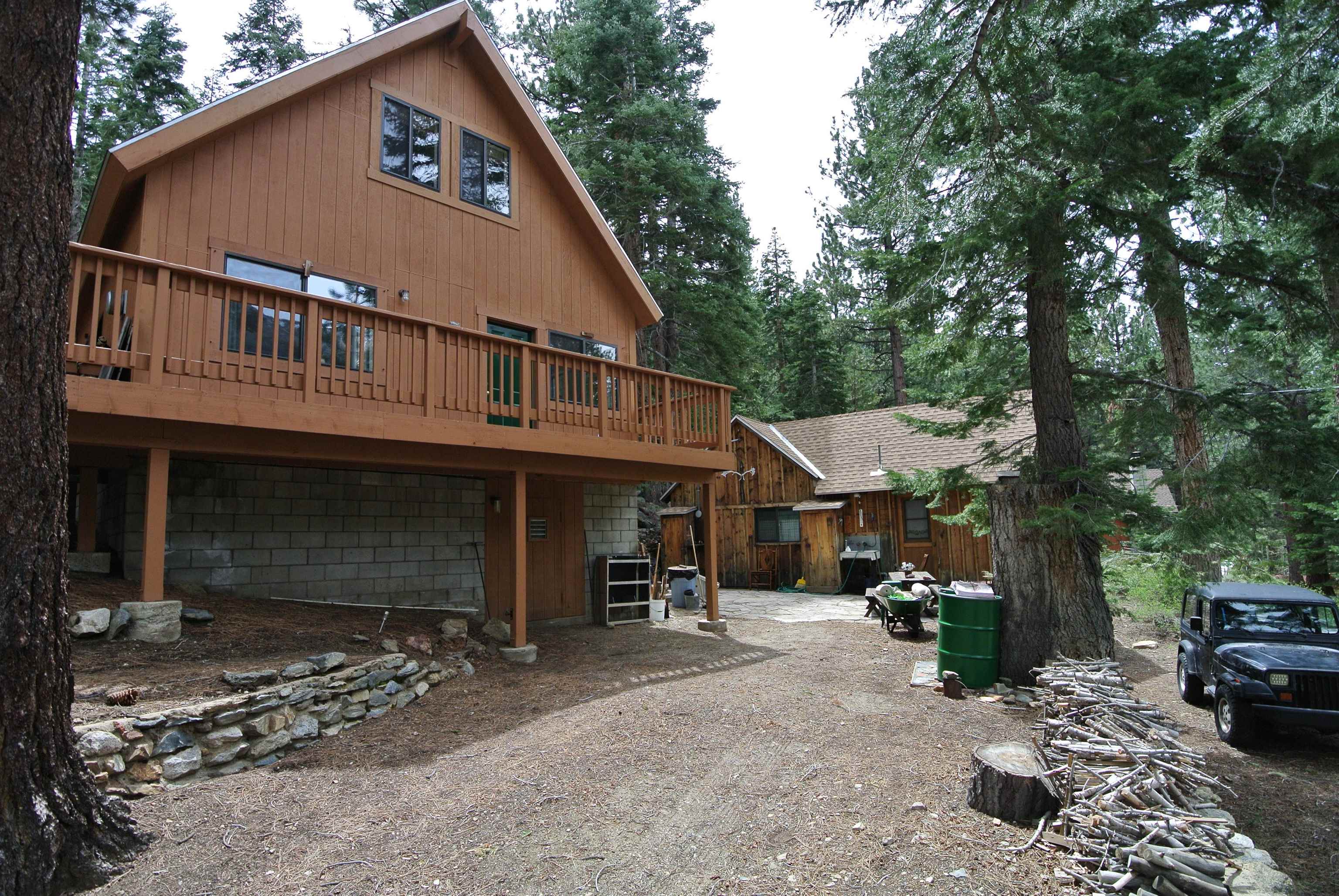 199 Hunewill Drive Bridgeport, CA 93517 - Photo 27 of 40 Wood-sided property with a second-story deck featuring a wood railing