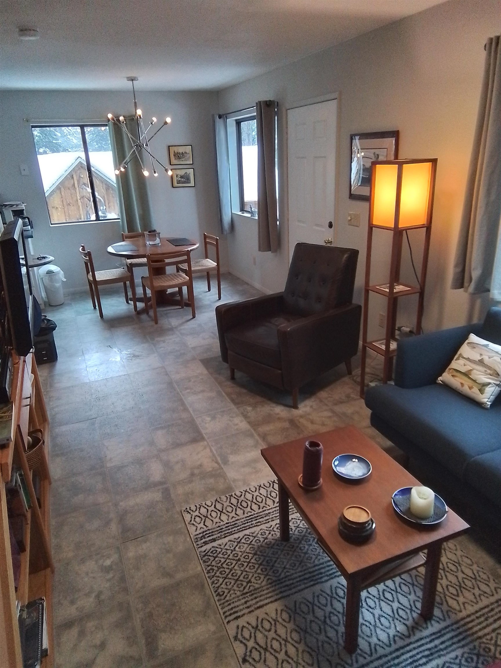 199 Hunewill Drive Bridgeport, CA 93517 - Photo 9 of 40 Open-concept living space with large format tile flooring and neutral wall tones