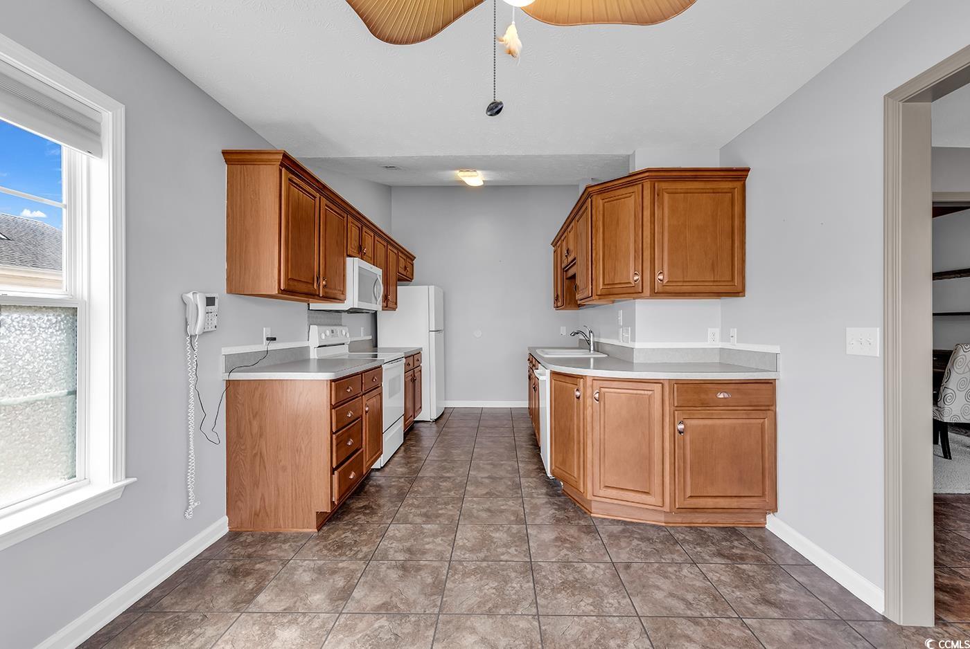 1336 Gailard Drive Conway, SC 29526 - Photo 15 of 39 Kitchen with white appliances, light countertops,