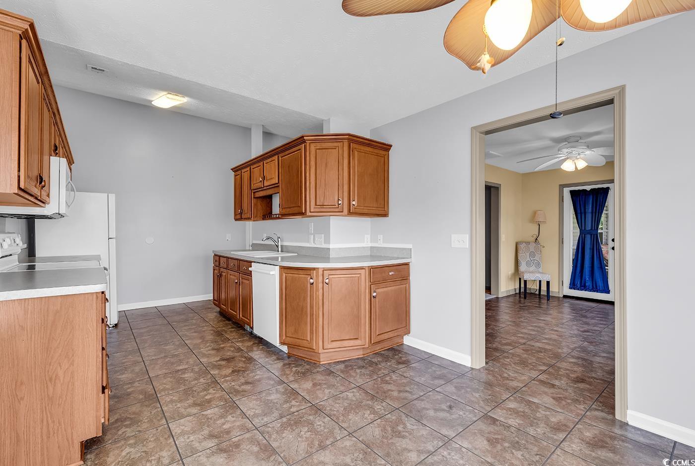 1336 Gailard Drive Conway, SC 29526 - Photo 16 of 39 Kitchen with a sink, white appliances, light count