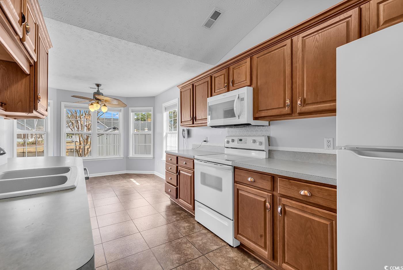 1336 Gailard Drive Conway, SC 29526 - Photo 18 of 39 Kitchen featuring white appliances, visible vents,