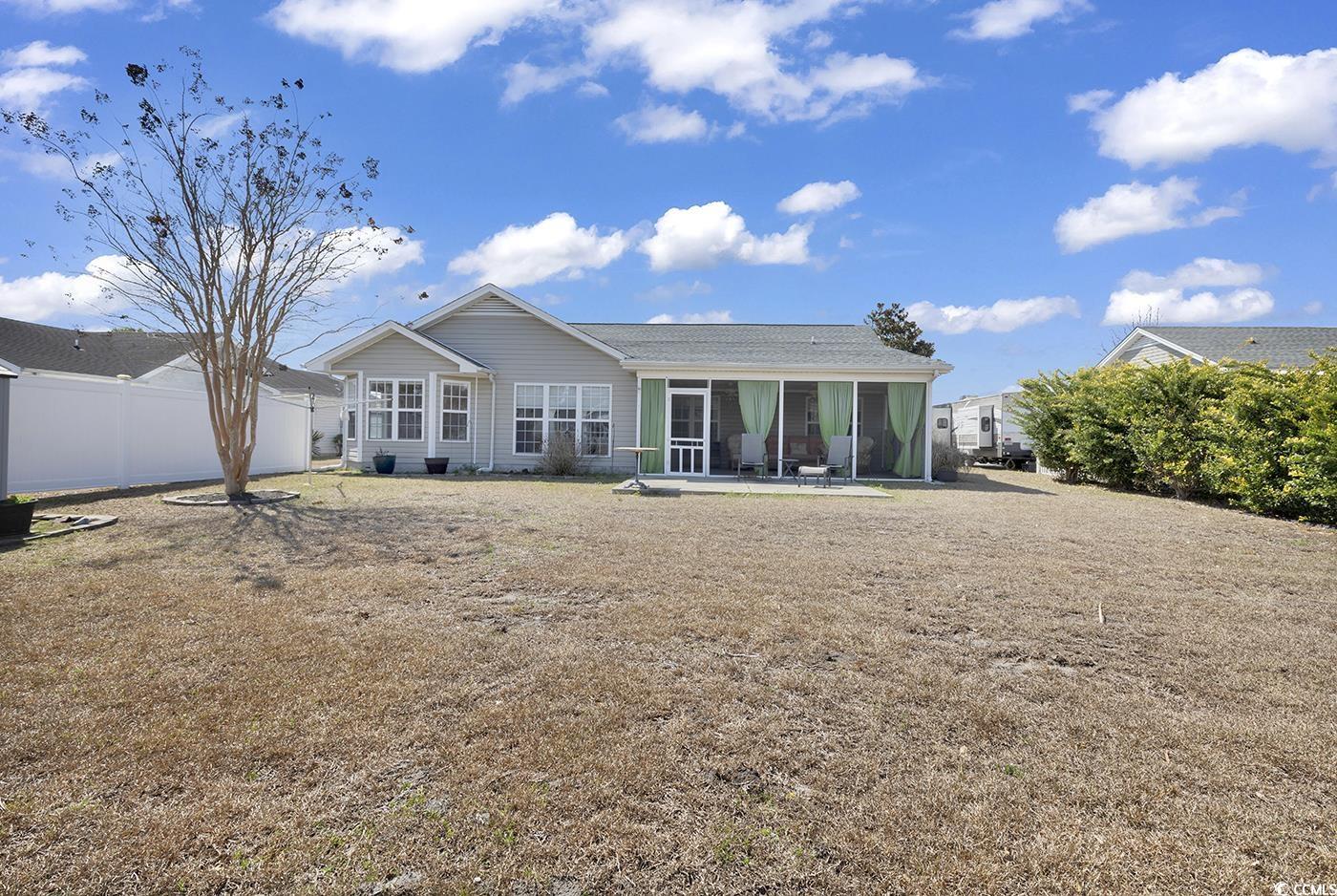 1336 Gailard Drive Conway, SC 29526 - Photo 37 of 39 Rear view of house with fence and a sunroom