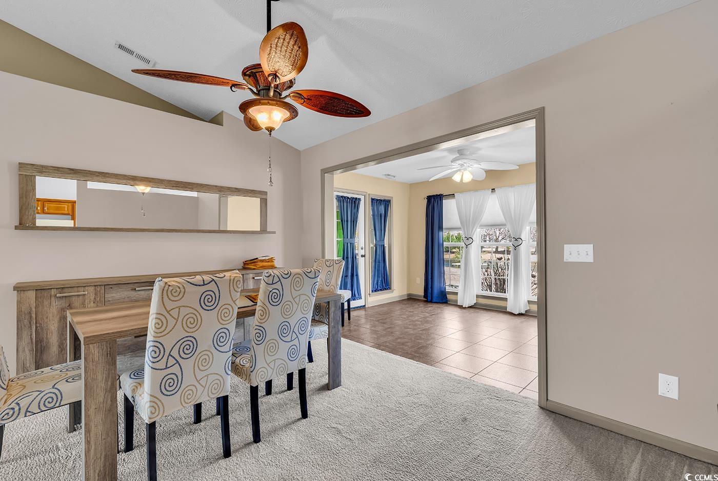 1336 Gailard Drive Conway, SC 29526 - Photo 7 of 39 Carpeted dining area with tile patterned floors, v