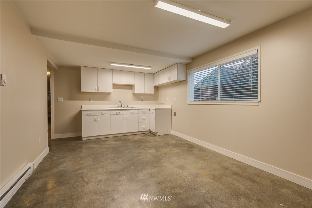 4314 Southwest Frontenac Street Seattle, WA 98136 - Photo 24 of 32 a view of a kitchen with a sink