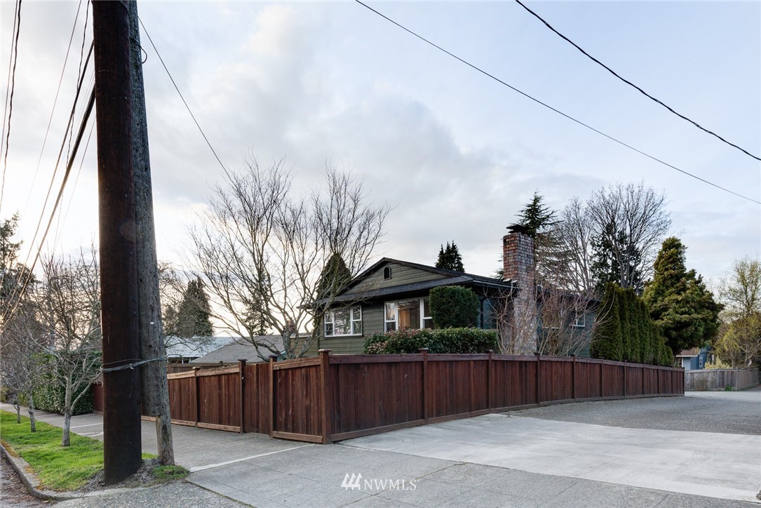 4314 Southwest Frontenac Street Seattle, WA 98136 - Photo 3 of 32 a view of a house with a backyard