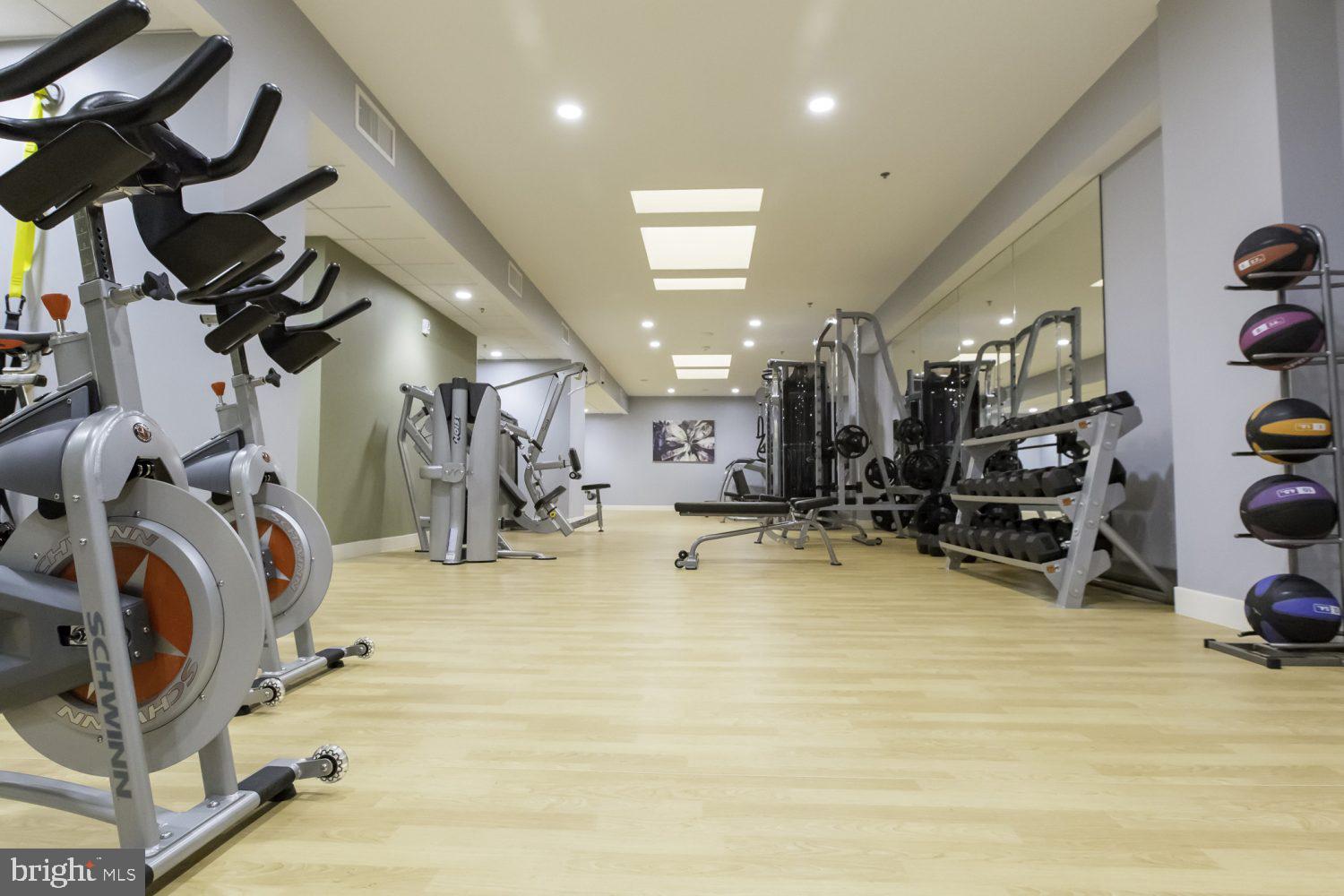 42 South 15th Street, Unit 0B0810 Philadelphia, PA 19102 - Photo 23 of 36 a view of a room with gym equipment