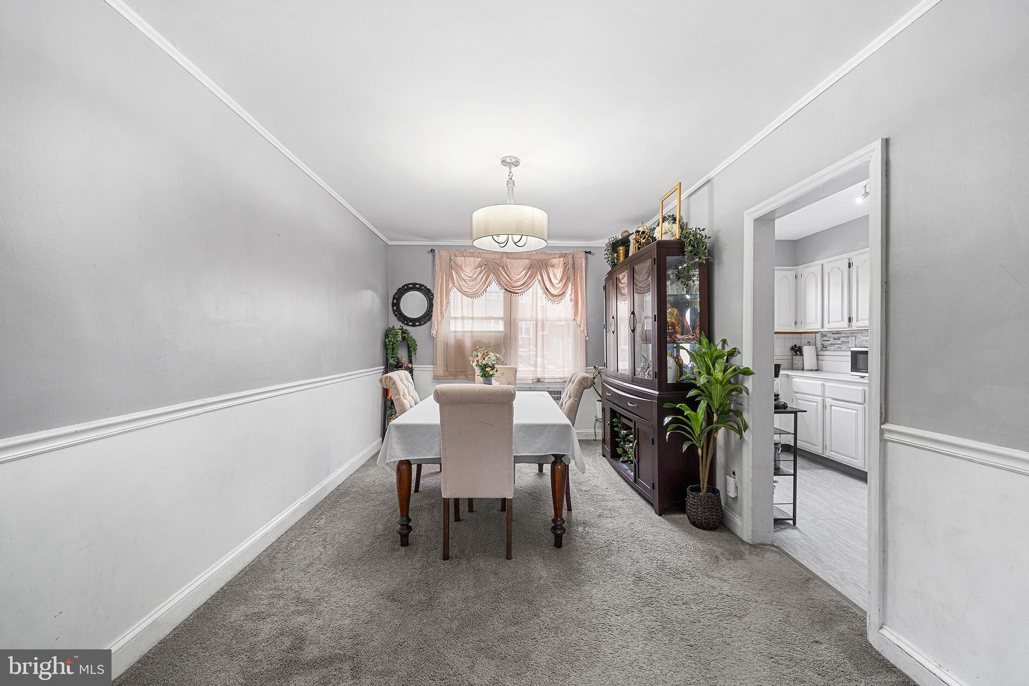 223 St Laurence Road Upper Darby, PA 19082 - Photo 11 of 32 a view of a dining room with furniture and a chandelier