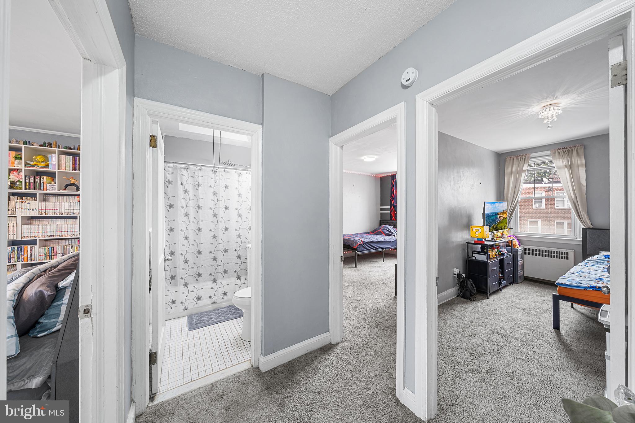 223 St Laurence Road Upper Darby, PA 19082 - Photo 16 of 32 a en suite bathroom with a tub and a view of bathroom