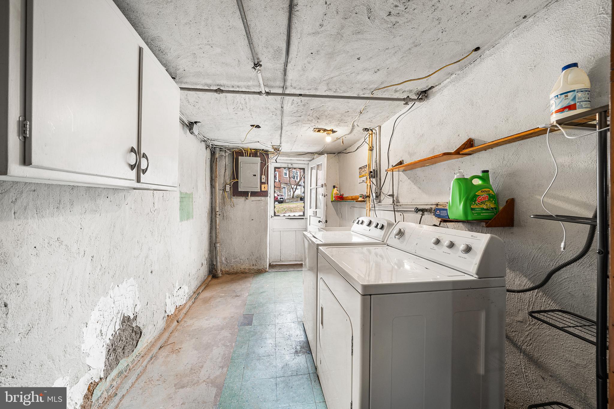 223 St Laurence Road Upper Darby, PA 19082 - Photo 23 of 32 a view of a storage & utility room with a sink dryer and washer