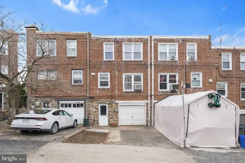 a car parked in front of a building