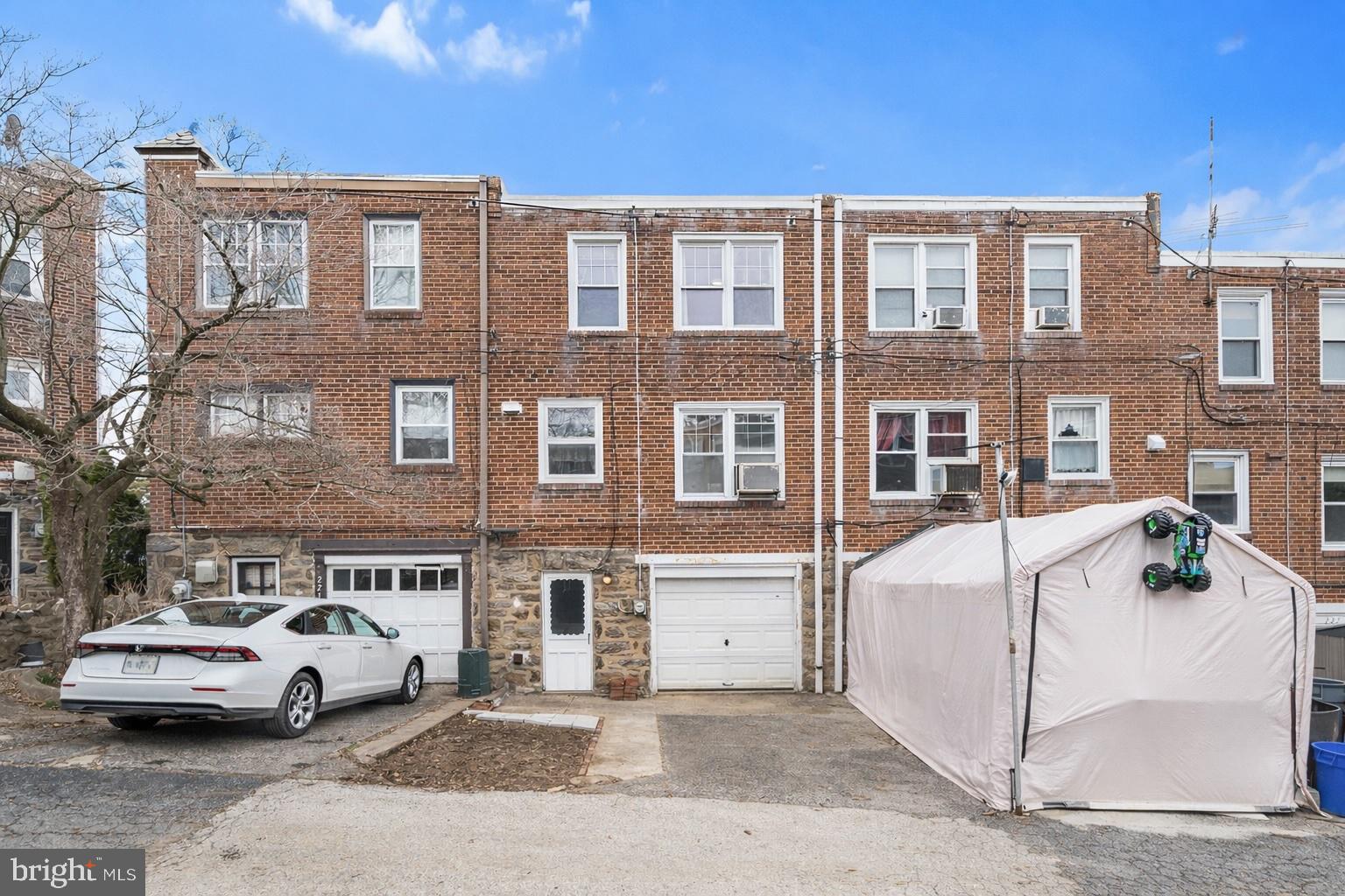 223 St Laurence Road Upper Darby, PA 19082 - Photo 25 of 32 a car parked in front of a building