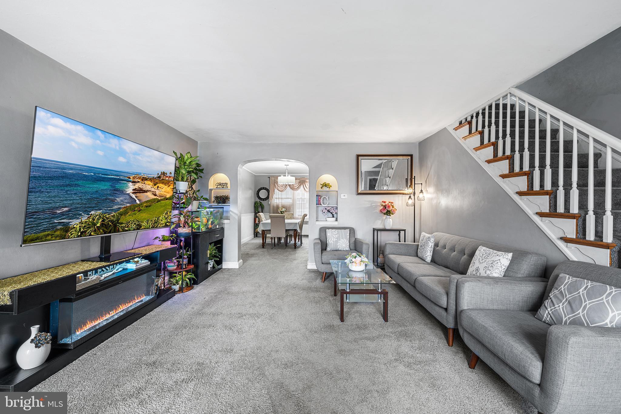 223 St Laurence Road Upper Darby, PA 19082 - Photo 4 of 32 a living room with furniture and a flat screen tv