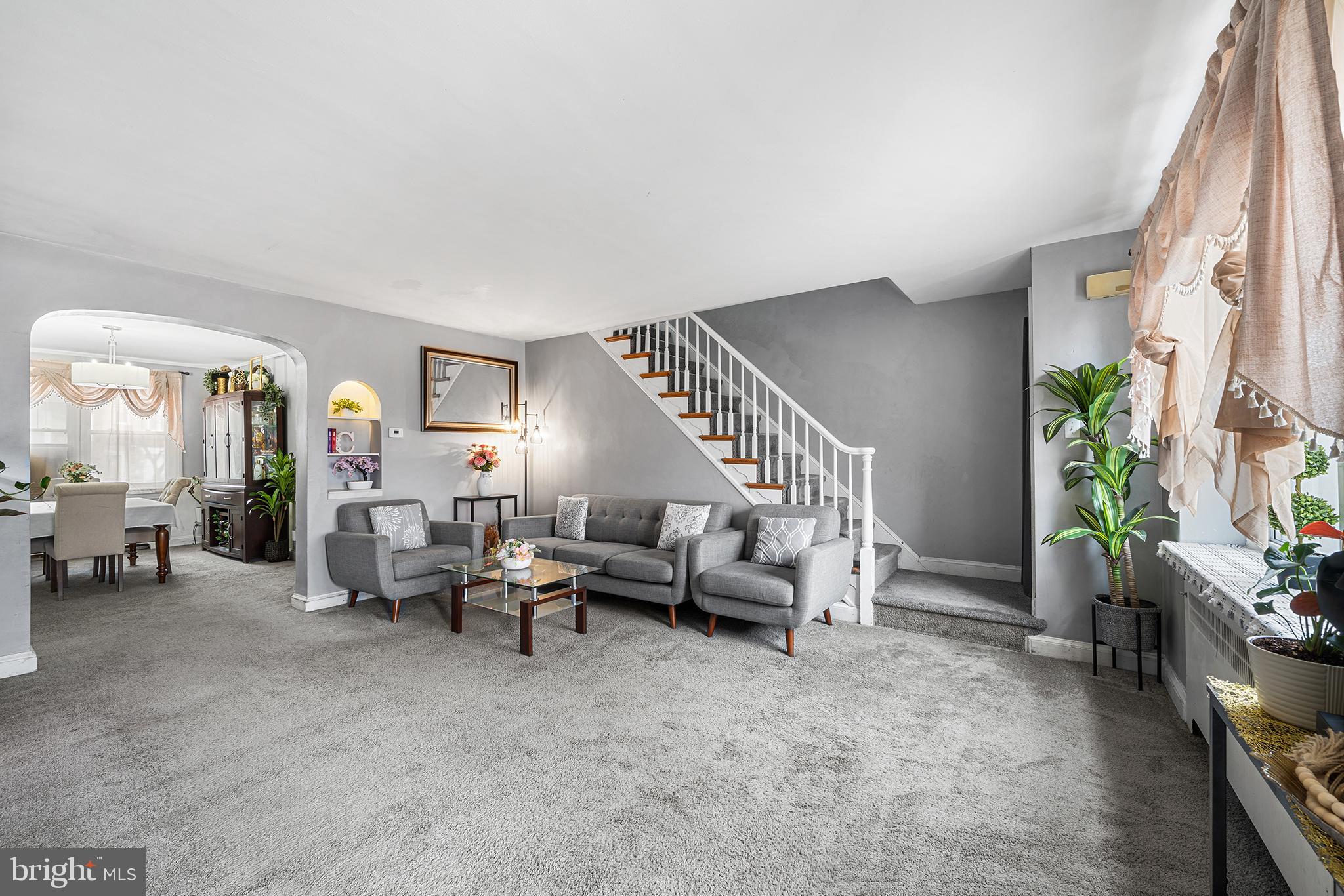 223 St Laurence Road Upper Darby, PA 19082 - Photo 6 of 32 a living room with furniture and a potted plant