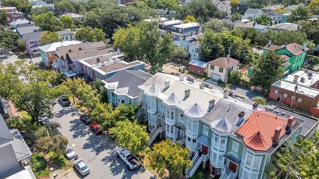 an aerial view of a city with lots of residential buildings