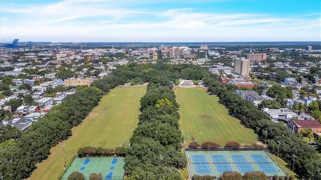an aerial view of residential building and lake