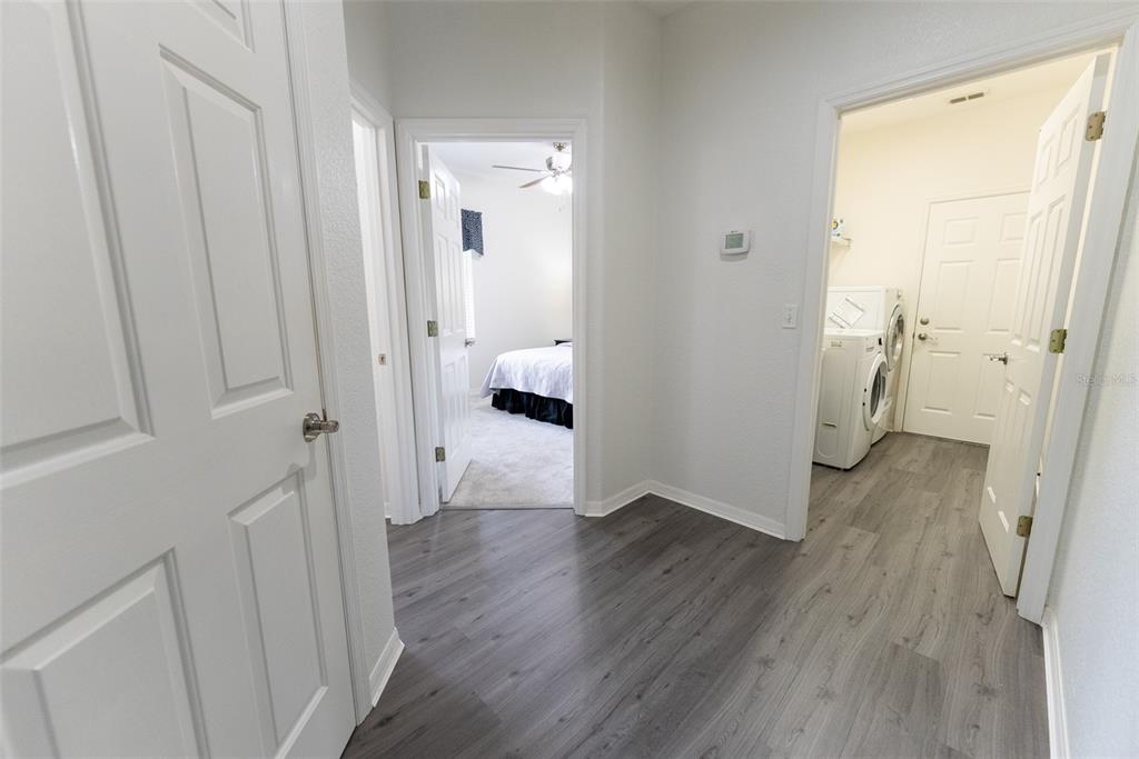 12855 Southeast 92nd Court Road Summerfield, FL 34491 - Photo 26 of 61 a view of a hallway with wooden floor