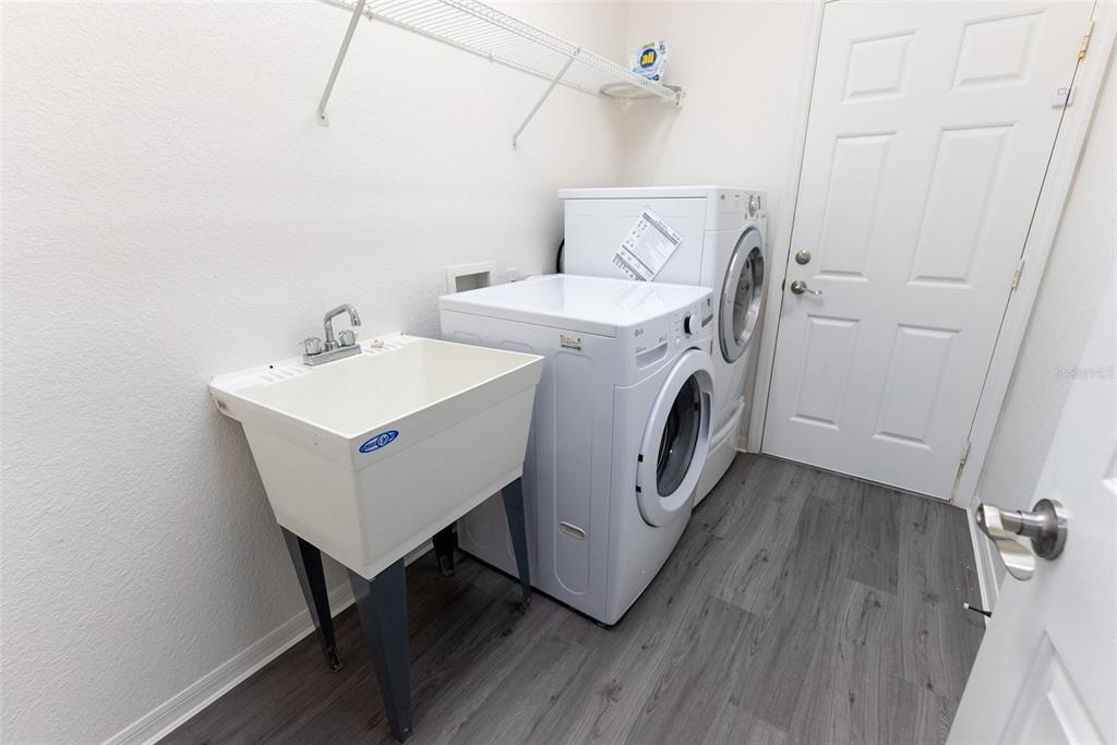 12855 Southeast 92nd Court Road Summerfield, FL 34491 - Photo 33 of 61 a utility room with dryer and washer