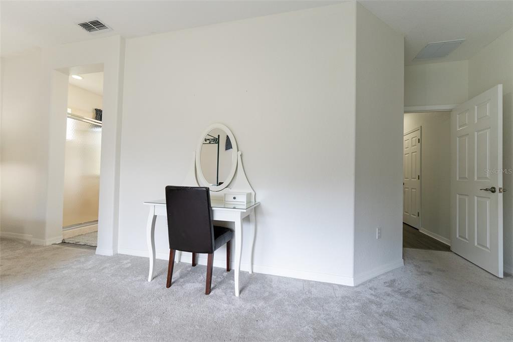 12855 Southeast 92nd Court Road Summerfield, FL 34491 - Photo 38 of 61 a view of a room with a table and chairs