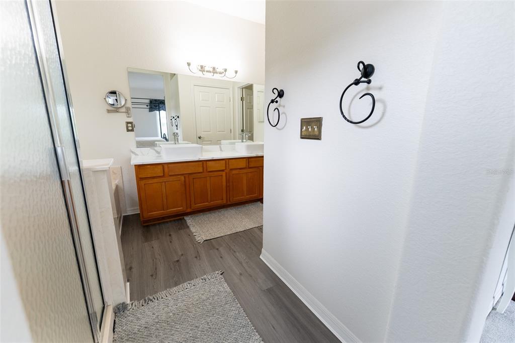 12855 Southeast 92nd Court Road Summerfield, FL 34491 - Photo 40 of 61 a bathroom with sink shower and mirror
