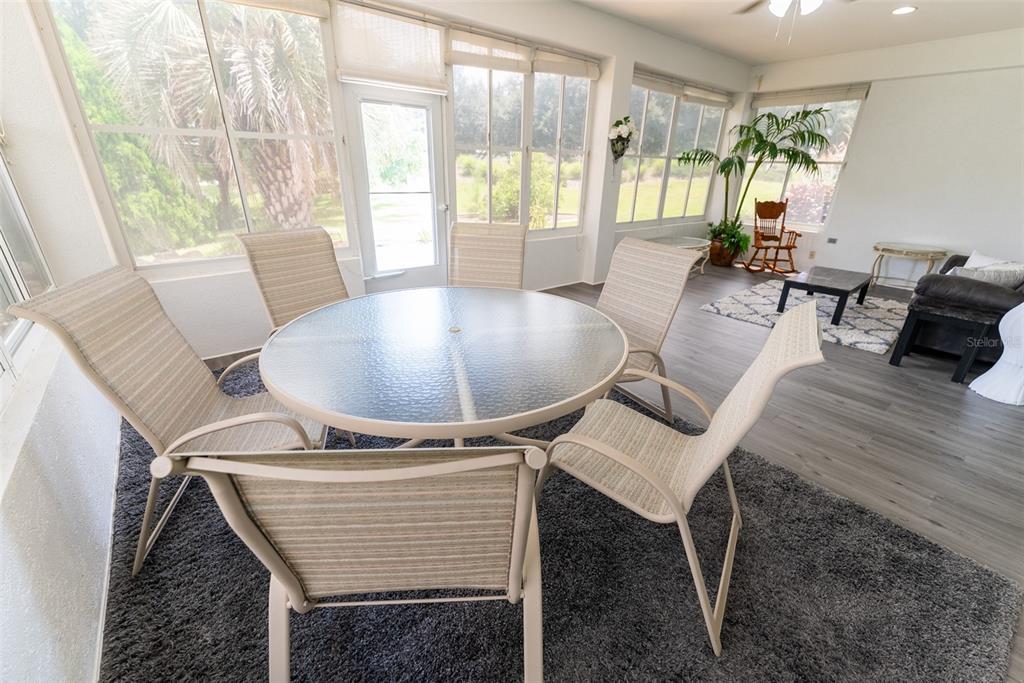 12855 Southeast 92nd Court Road Summerfield, FL 34491 - Photo 51 of 61 a living room with furniture and a large window