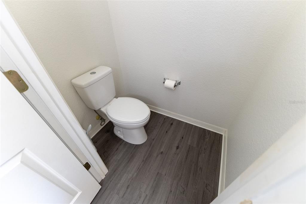 12855 Southeast 92nd Court Road Summerfield, FL 34491 - Photo 54 of 61 a bathroom with a toilet and a sink