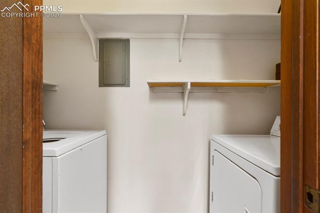 1130 Fontmore Road, Unit C Colorado Springs, CO 80904 - Photo 16 of 27 a utility room with dryer and washer