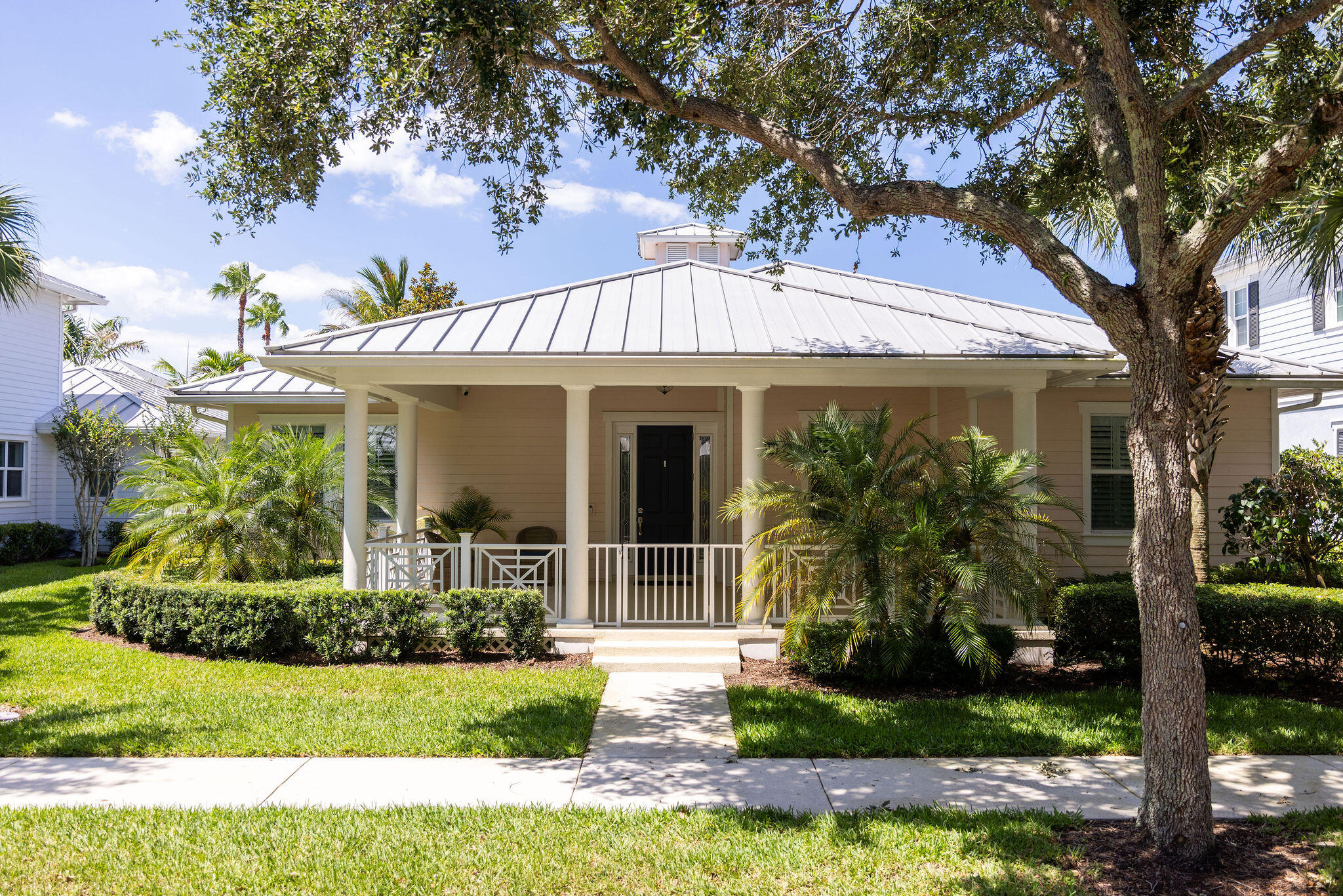 1037 Duval Street Jupiter, FL 33458 - Photo 1 of 47 front view of a house with a yard