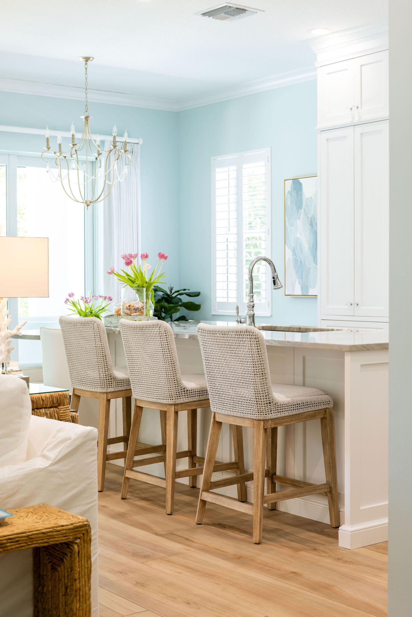 1037 Duval Street Jupiter, FL 33458 - Photo 12 of 47 a dining table chairs and a chandelier in a kitchen
