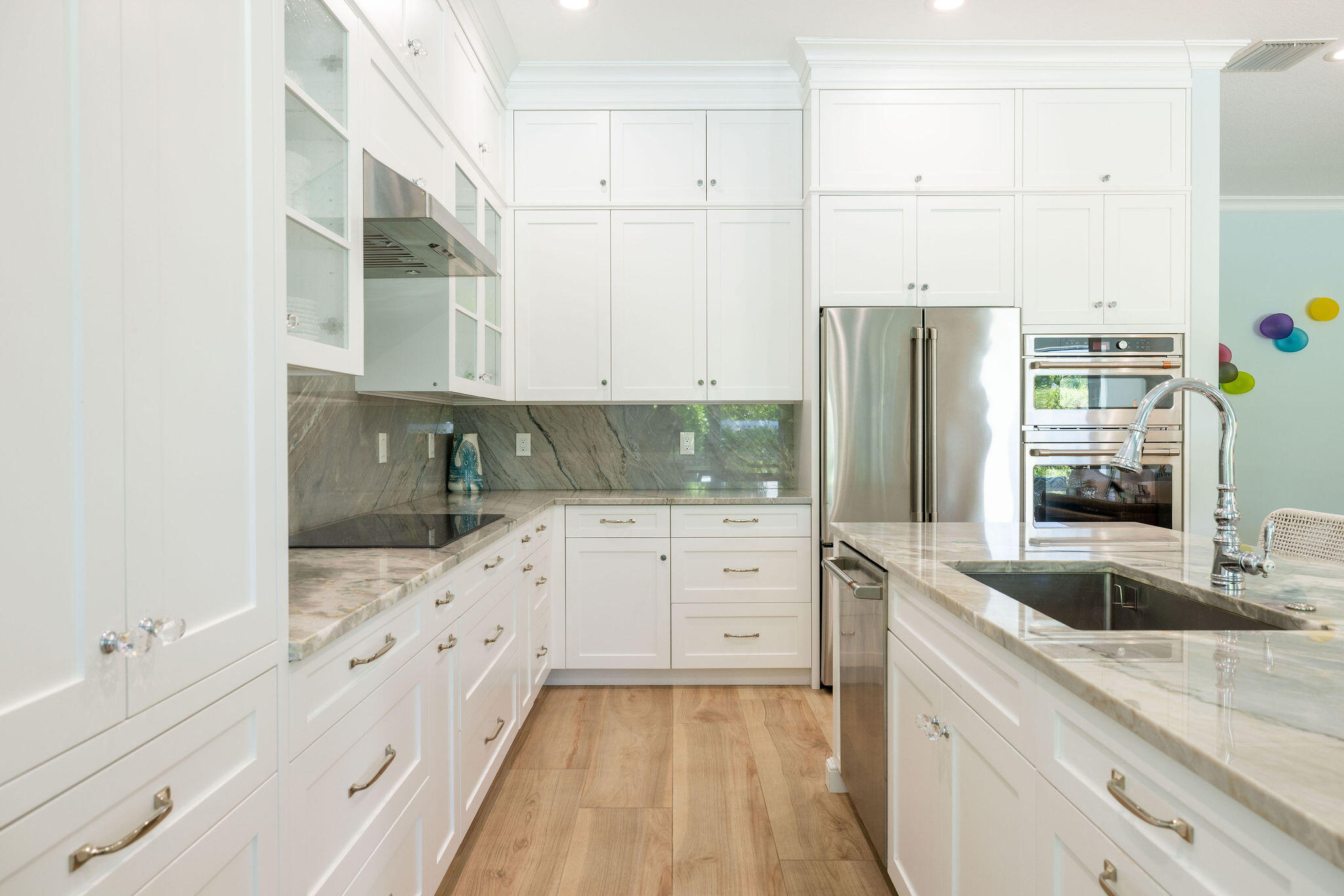 1037 Duval Street Jupiter, FL 33458 - Photo 14 of 47 a kitchen with granite countertop a sink and cabinets