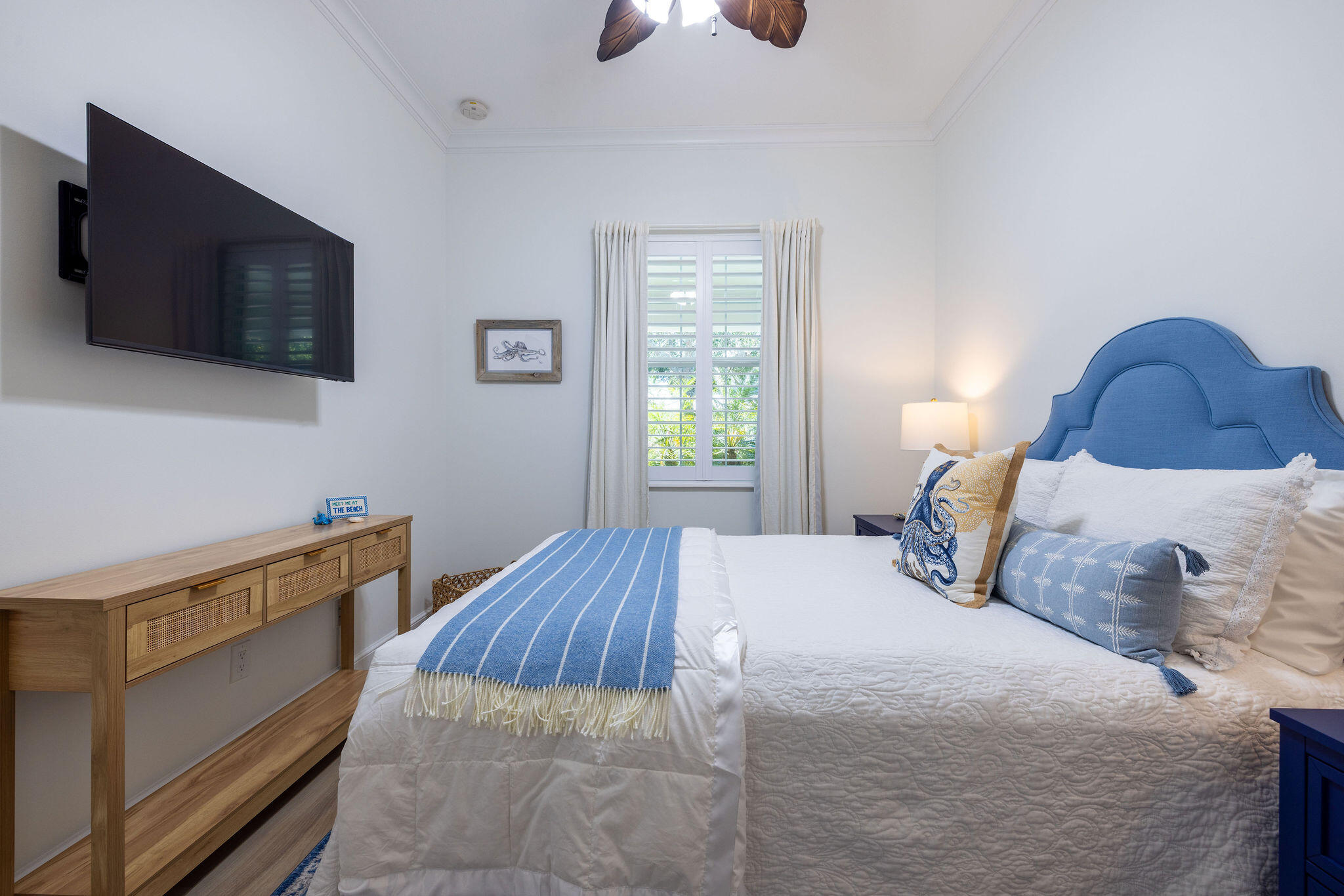 1037 Duval Street Jupiter, FL 33458 - Photo 27 of 47 a bedroom with a bed and a tv