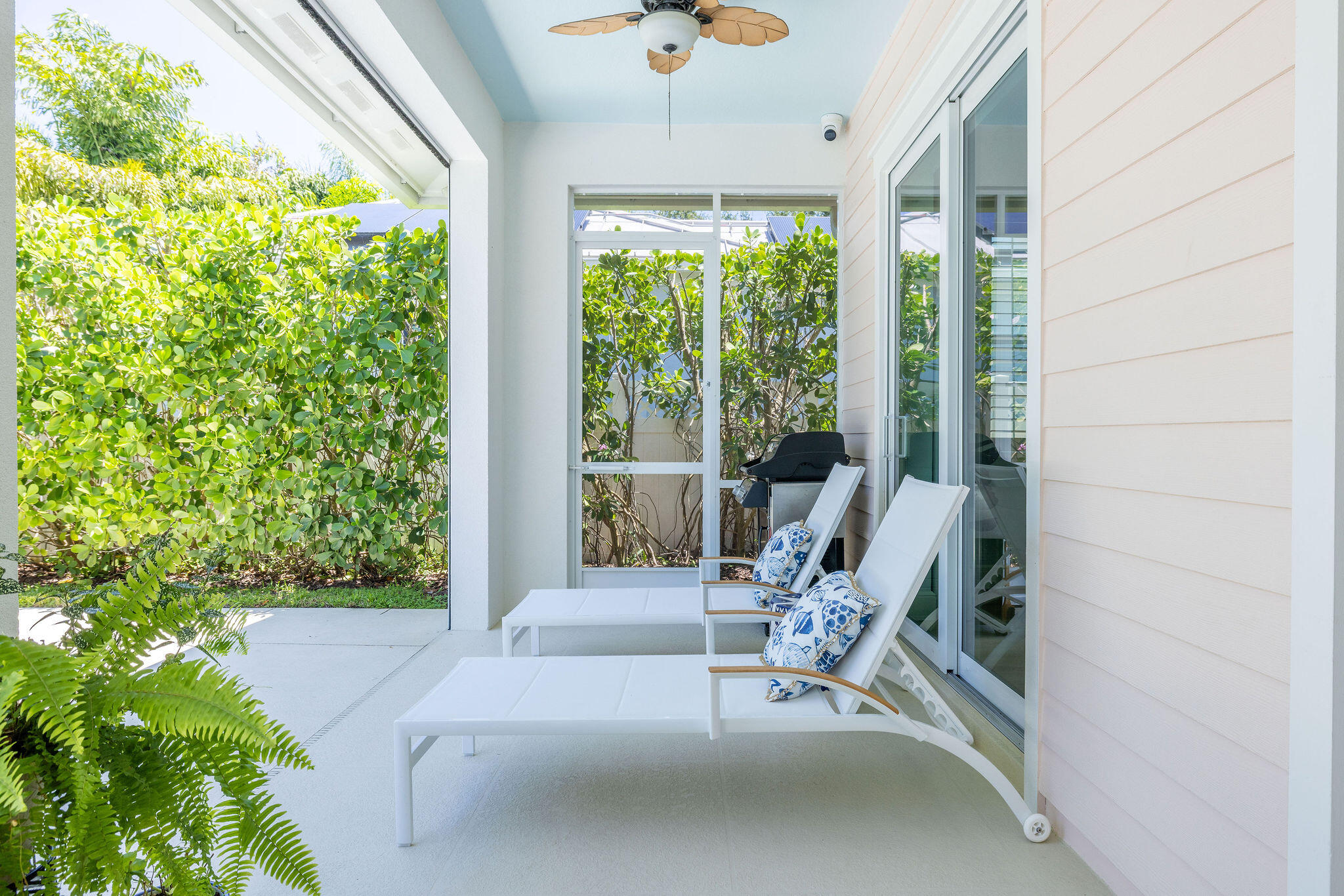 1037 Duval Street Jupiter, FL 33458 - Photo 35 of 47 a view of a patio with chair and tables the patio