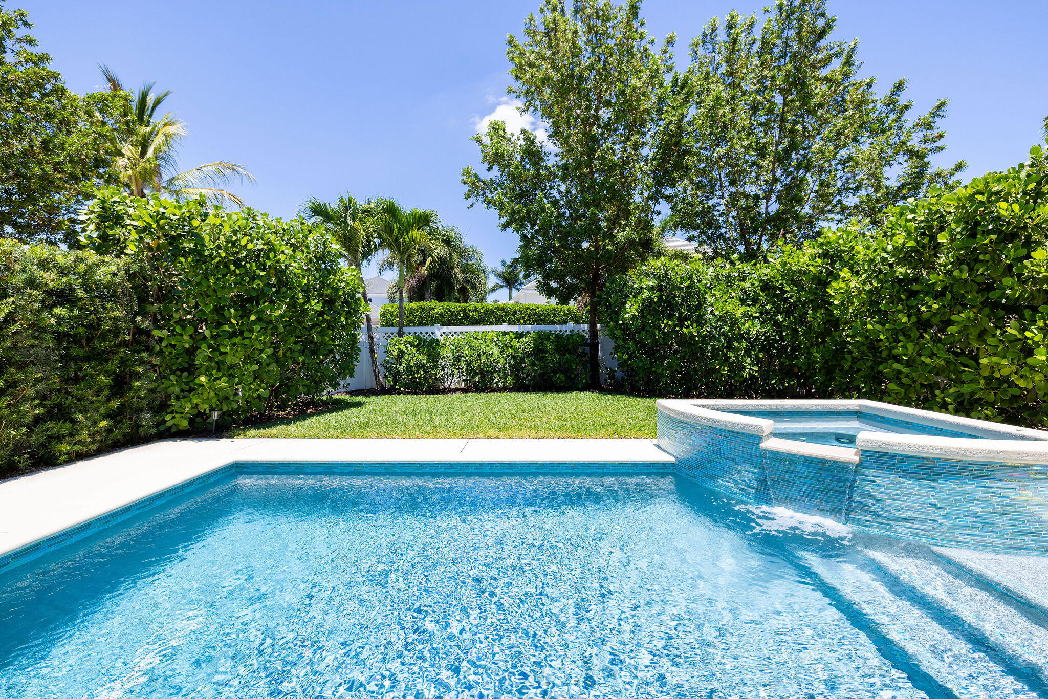 1037 Duval Street Jupiter, FL 33458 - Photo 38 of 47 a view of a swimming pool with an outdoor space and seating area