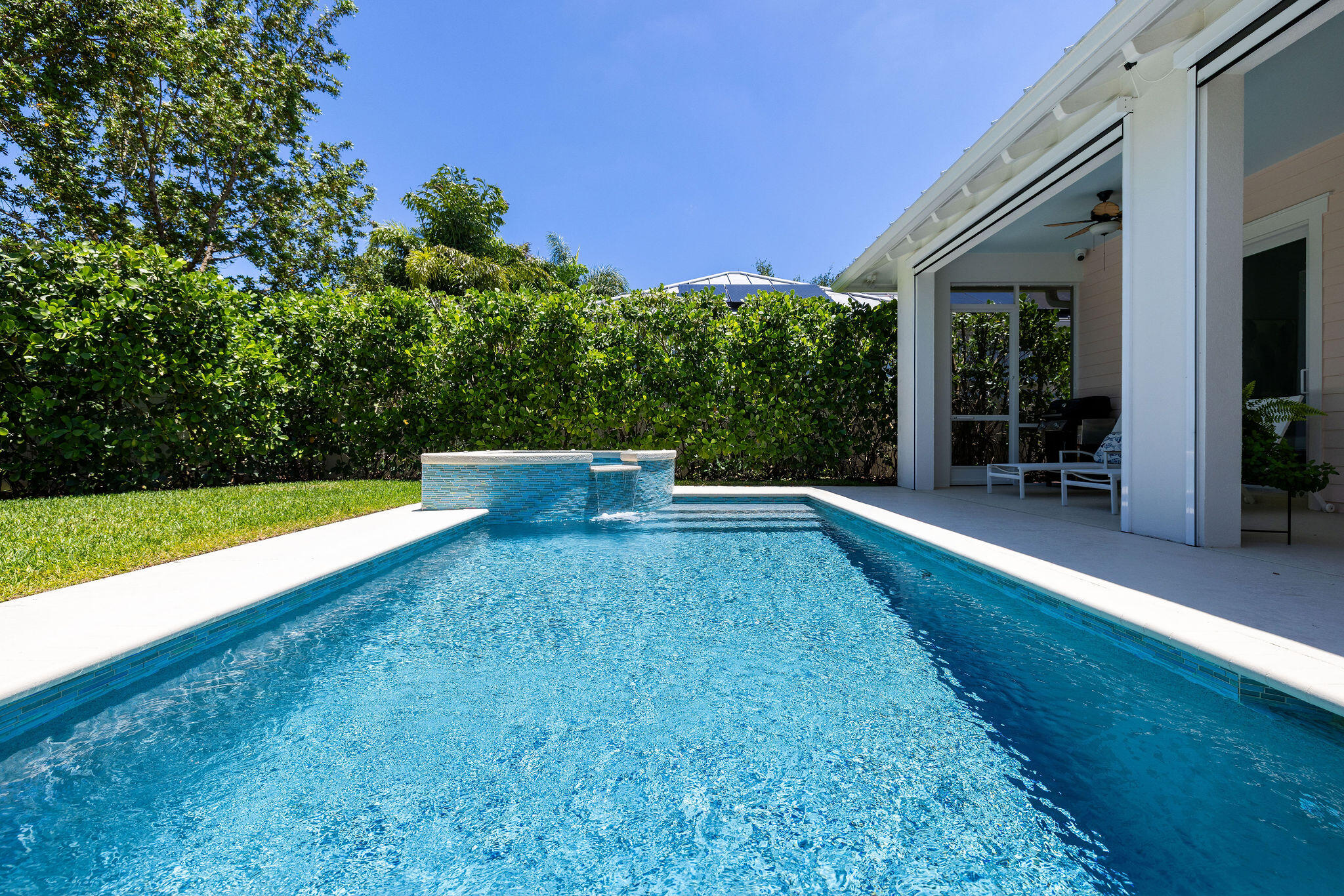 1037 Duval Street Jupiter, FL 33458 - Photo 39 of 47 a view of an outdoor space with a swimming pool