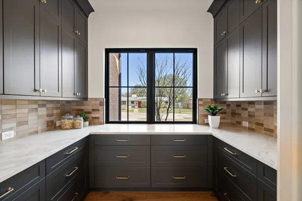 a room with a dresser and a mirror