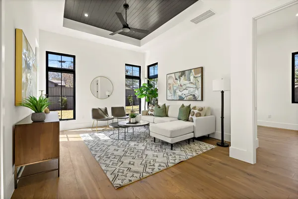 a kitchen with sink and cabinets