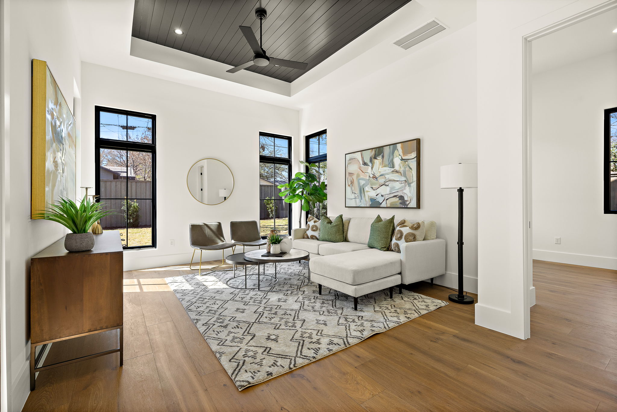 5906 Rickey Drive Austin, TX 78757 - Photo 25 of 38 a living room with furniture and wooden floor